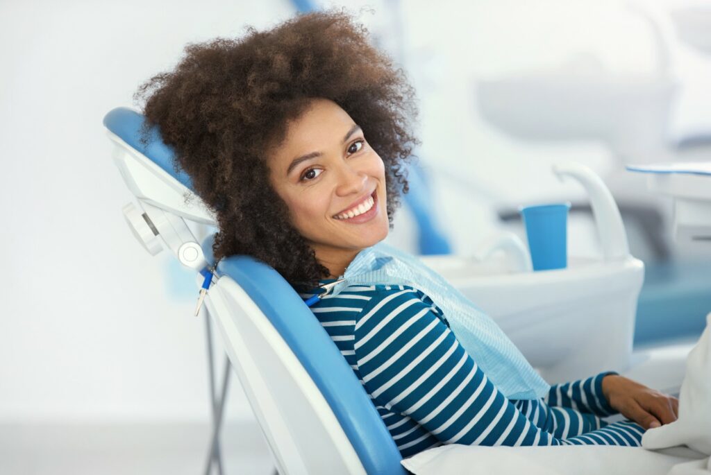 patient smiling in dental chair